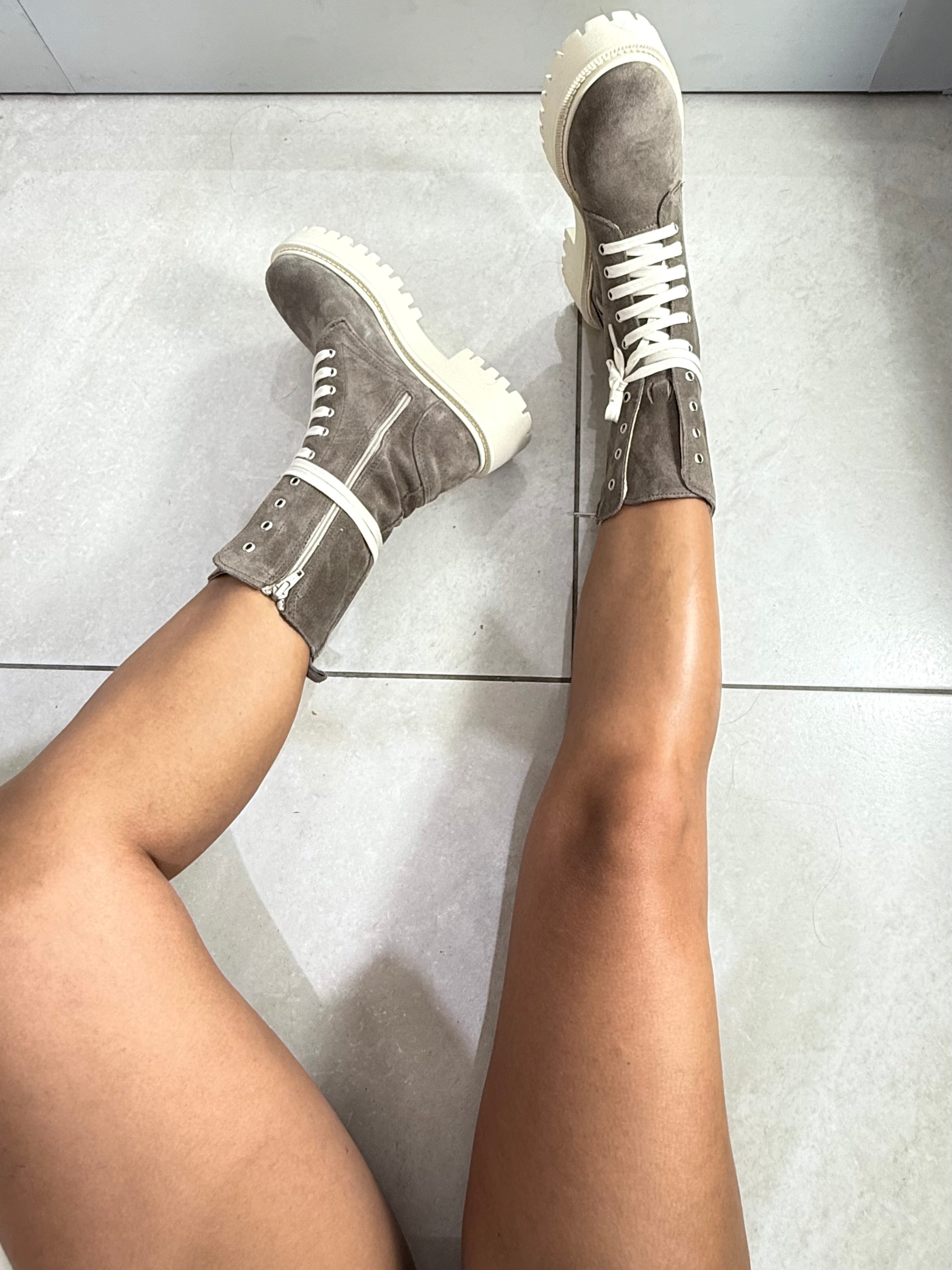 Ingrandisci