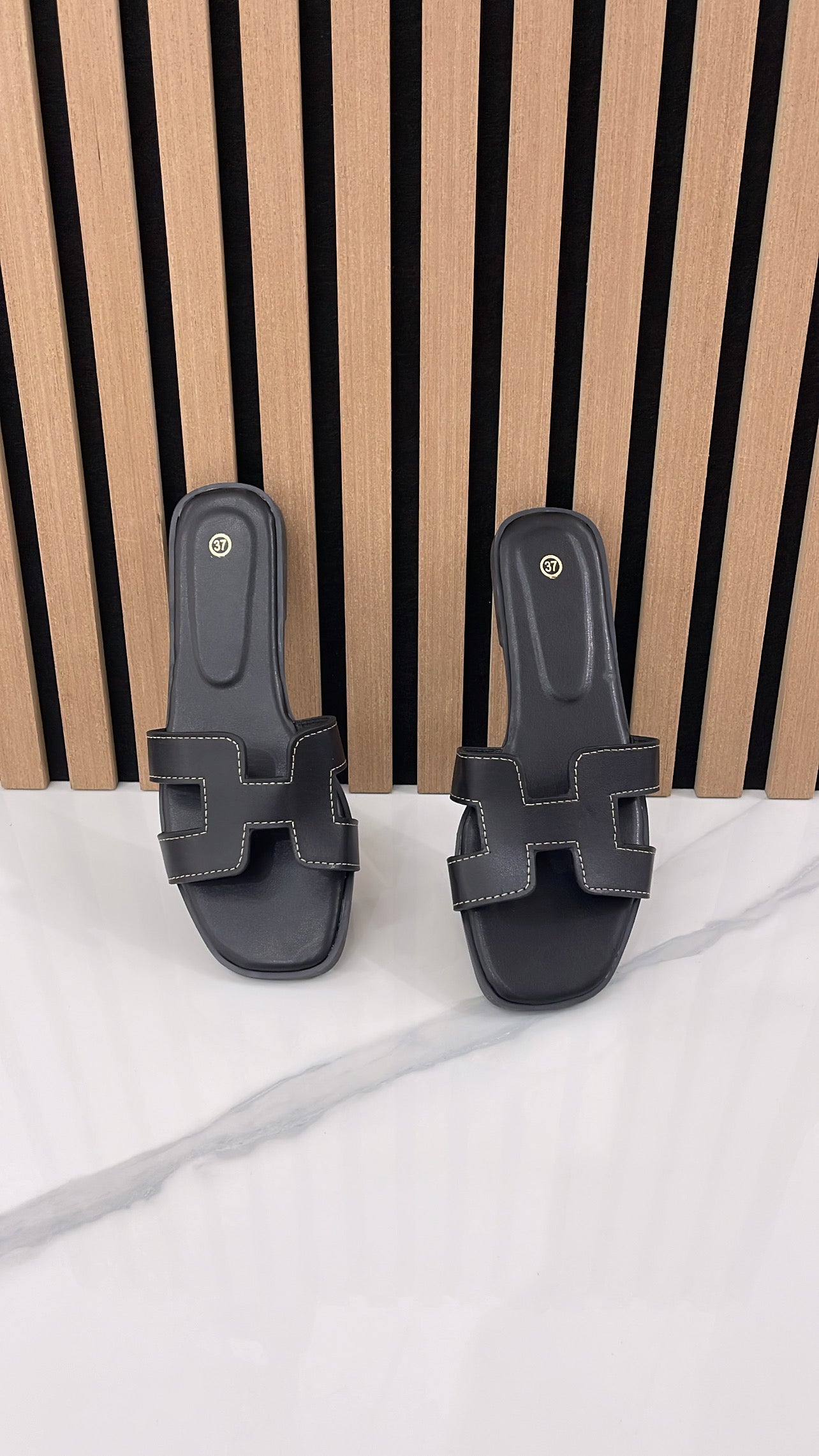 Ingrandisci