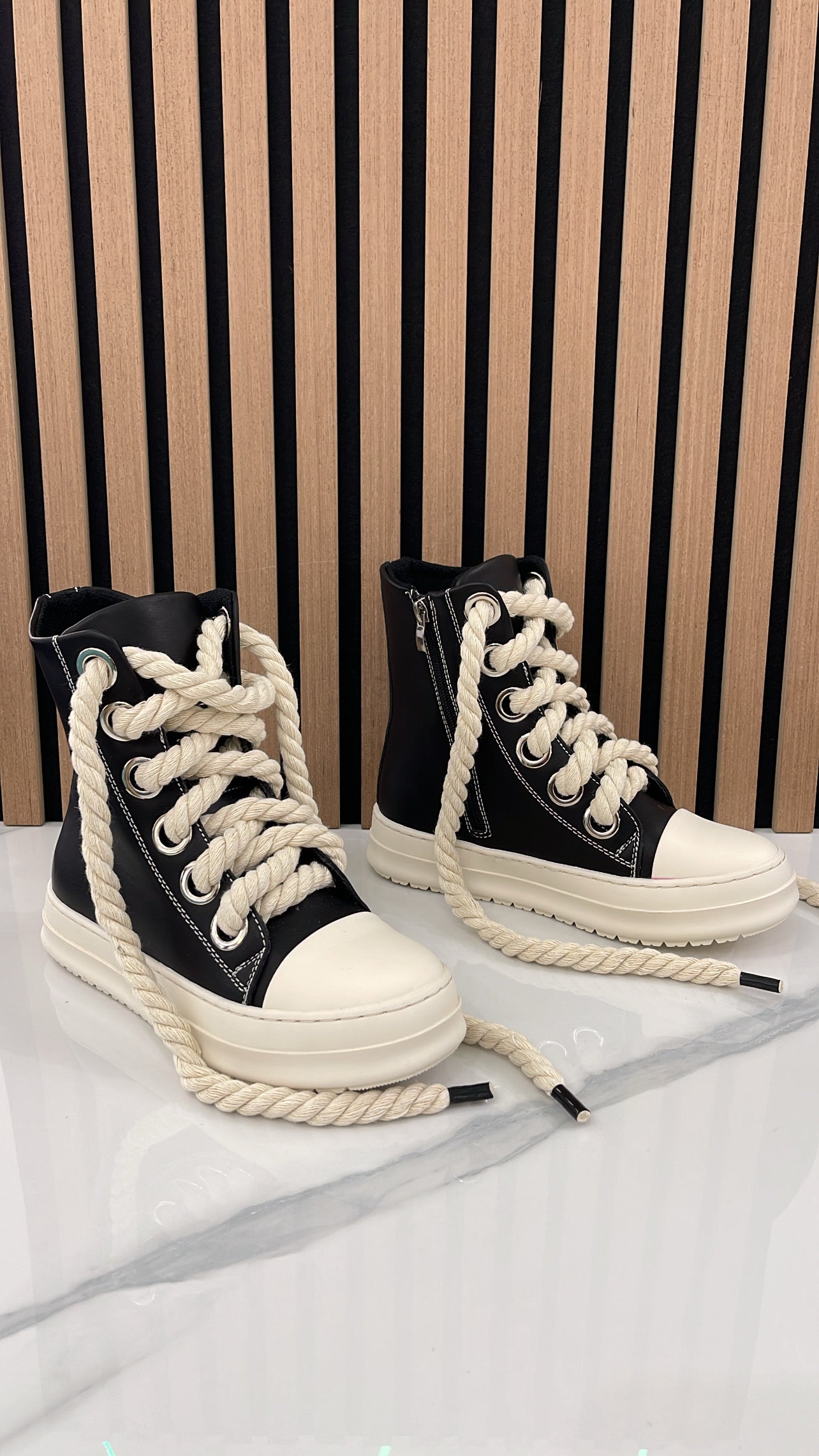 Ingrandisci